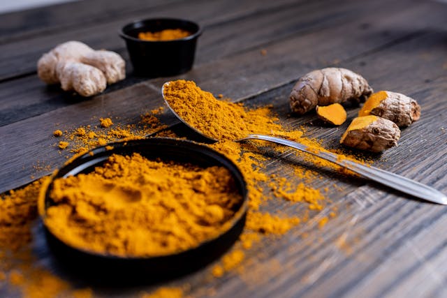 Turmeric - A vibrant close-up of turmeric roots, symbolizing its golden hue and potent anti-inflammatory properties in Patrick Murphy's herbal arsenal.